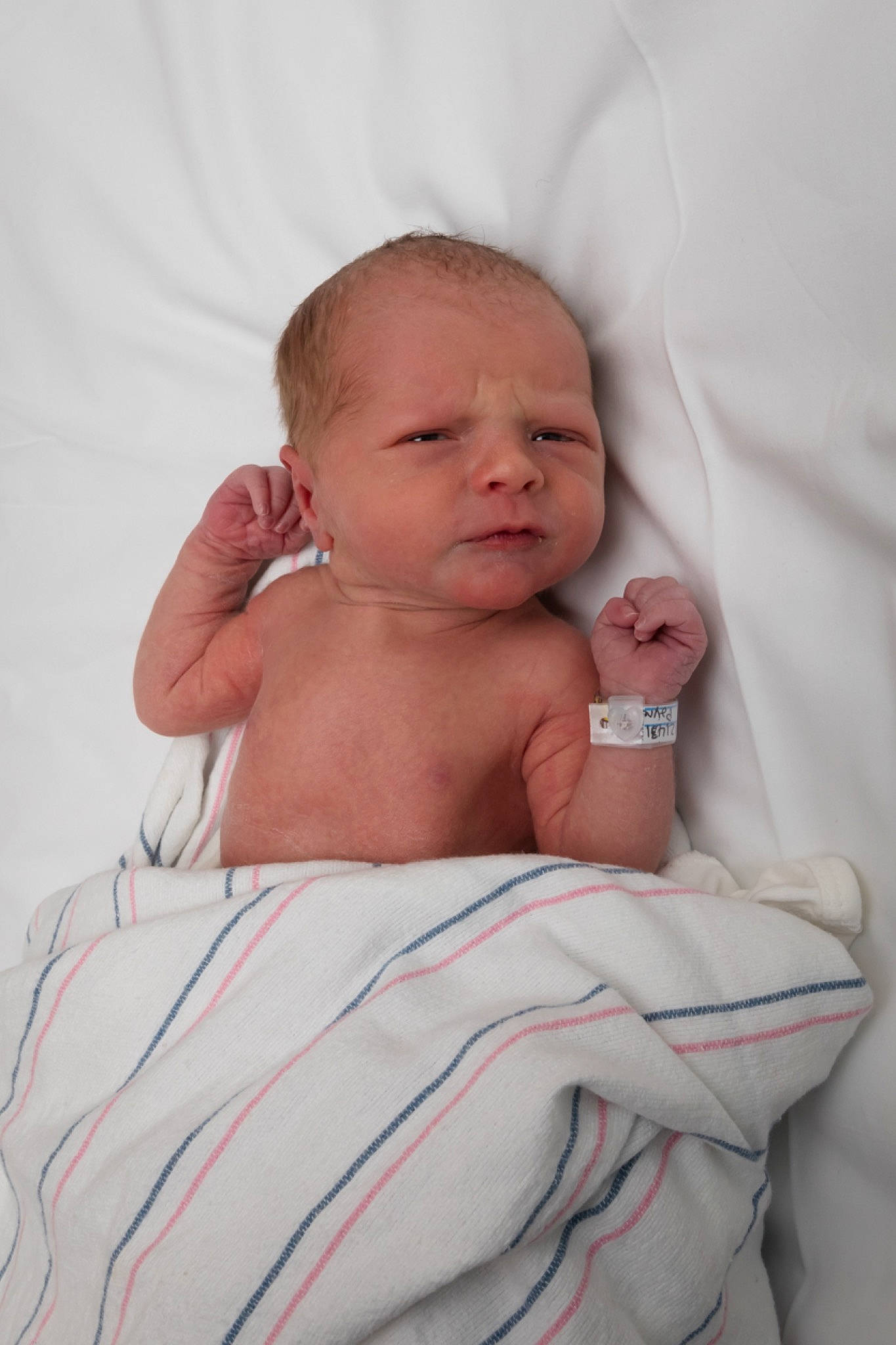 Kashton is registered to the contest to win money with this photo: abdomen, arm, baby, baby_toddler_clothing, cheek, chest, child, comfort, event, eye, finger, hand, lip, pattern, person, sitting, stomach, thumb, toddler, trunk