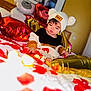 Kalye joined the competition — help win amazing prizes! balloons, bear_shaped, bed, black, brown, child, cozy_clothing, cute, hat, heart_shaped, indoors, pom_poms, portrait, red, rose_petals, sleepy, soft_lighting, toddler, white, yellow
