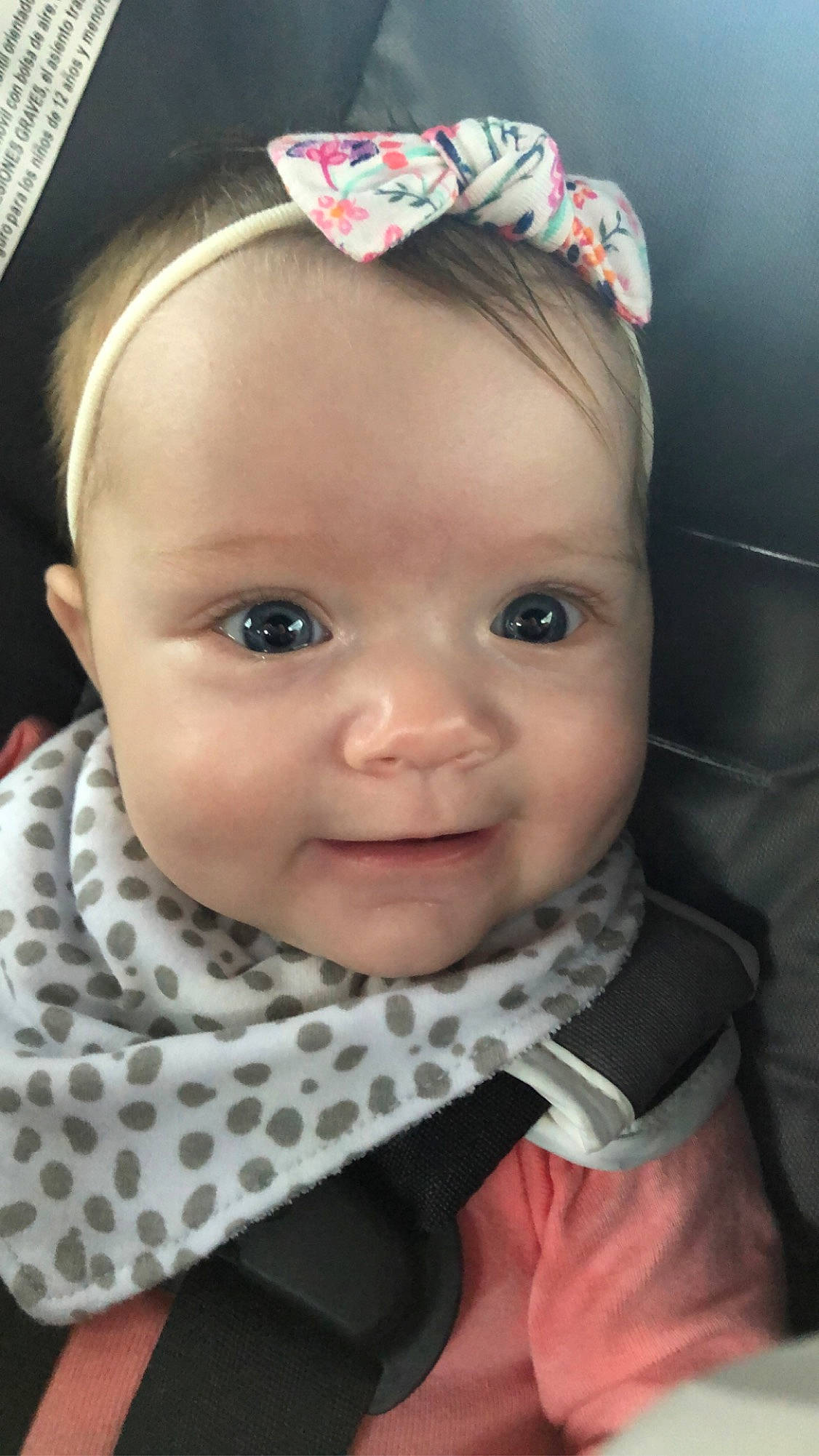 Elaina joined the competition — help win amazing prizes! baby, baby_toddler_clothing, cap, cheek, chin, dress, eye, eyebrow, eyelash, headgear, iris, lip, nose, outerwear, person, pink, skin, sleeve, smile, textile