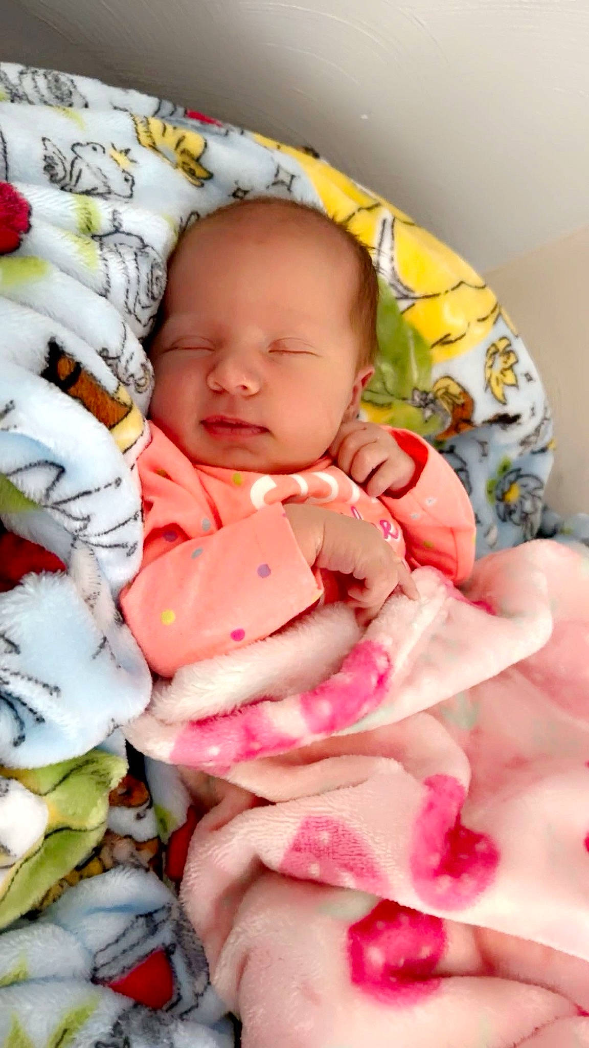 Eliana joined the competition — help win amazing prizes! baby, baby_products, baby_sleeping, baby_toddler_clothing, bedding, bedtime, cheek, child, chin, comfort, eye, happy, linens, mouth, person, petal, pink, skin, sleeve, textile