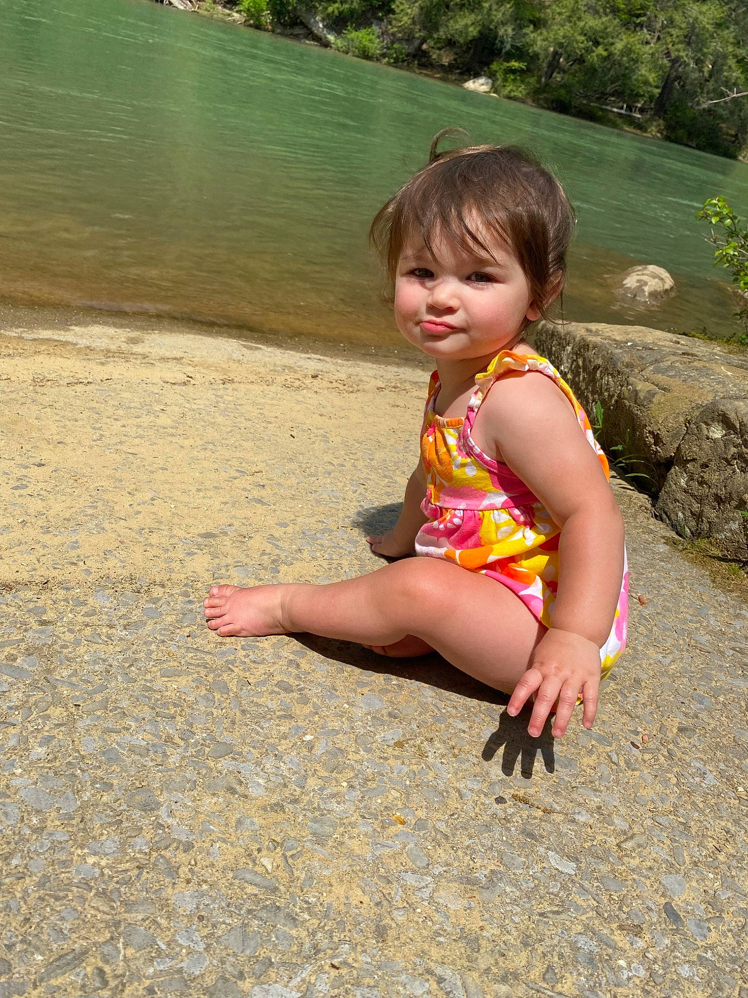 Oakleigh is registered to the contest to win money with this photo: barefoot, dress, eye, foot, fun, grass, hair, happy, human_body, human_leg, lake, leg, leisure, people_in_nature, person, plant, smile, thigh, toddler, tree