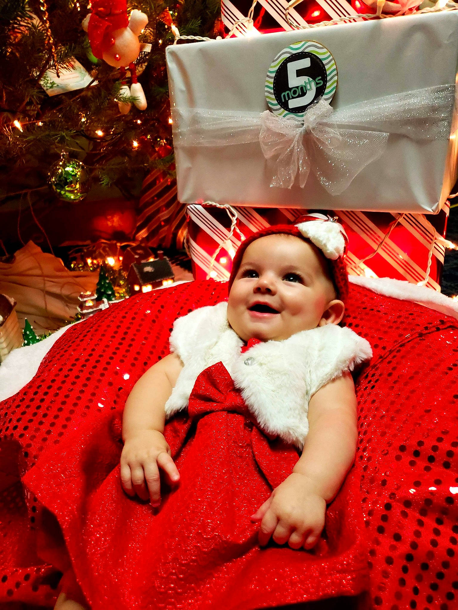 Kaleigha joined the competition — help win amazing prizes! child, christmas, christmas_decoration, fun, girl, happiness, holiday, infant, person, product, red, smile, toddler