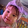 Harper joined the competition — help win amazing prizes! baby, baby_girl, bunny_ears, child, close_up, clothing, cute, face, furniture, hand, happy, headband, indoor, infant, person, portrait, purple, smiling, soft, wooden_chair