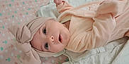 Athénaïs a rejoint le concours — aidez-le/la à gagner de superbes lots ! baby, bed, blanket, bodypart, bonnet, cap, clothing, crib, face, finger, furniture, hand, hat, head, hood, infantbed, newborn, person, photography, portrait