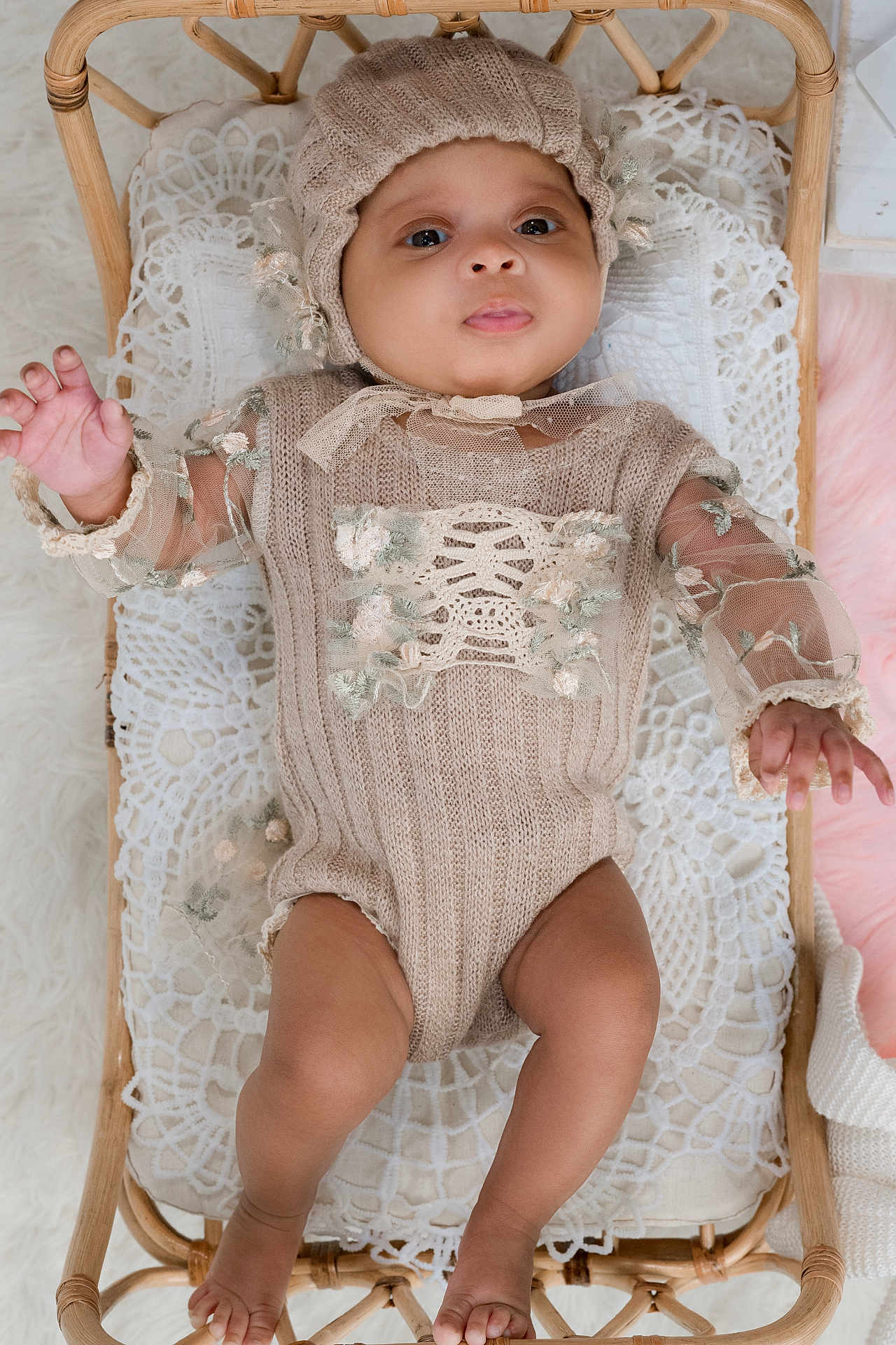Eva joined the competition — help win amazing prizes! baby, infant, wicker_bassinet, lace, knit_clothing, floral_embroidery, beige, soft_texture, pastel, cute, child, portrait, indoors, sleeping_area, hand, foot, expression, cozy, lying_down, headwear