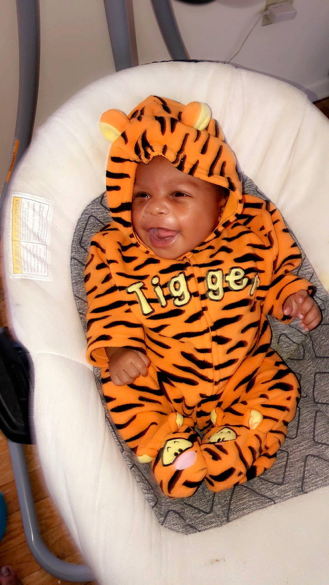 Diamond is registered to the contest to win money with this photo: baby, big_cats, child, felidae, headwear, orange, person, tiger, toddler