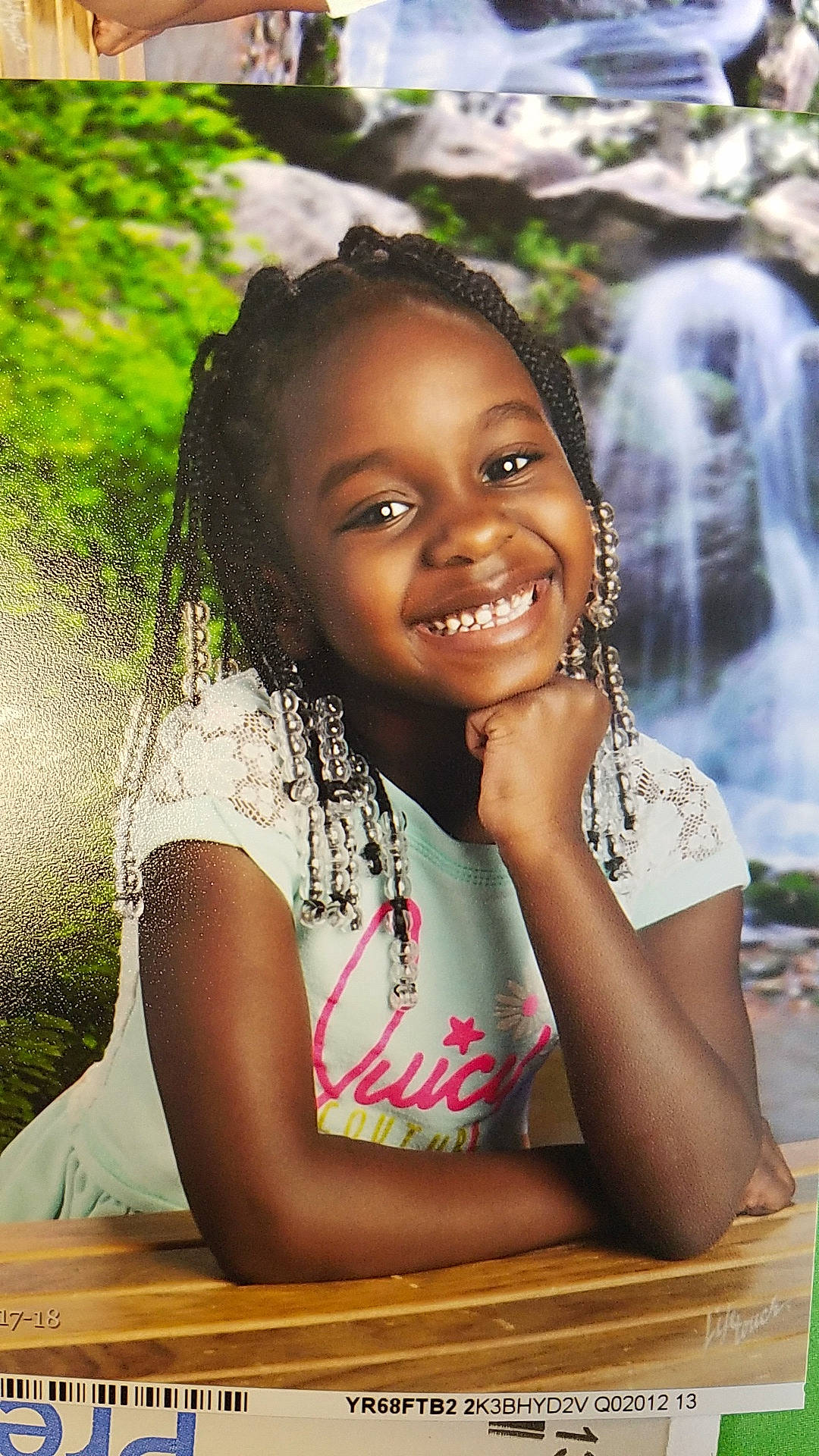 Robin is registered to the contest to win money with this photo: adaptation, beauty, black_hair, child, child_model, fawn, hair, happy, joy, person, photography, portrait, sitting, smile