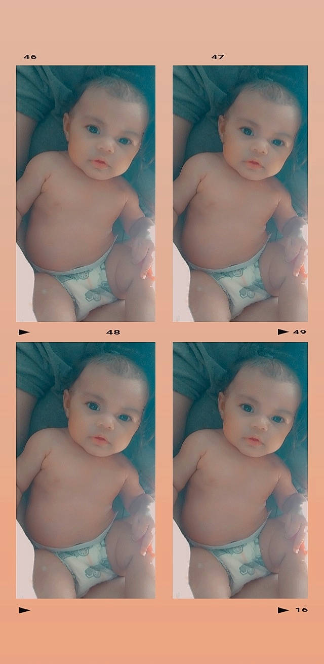 Alyciana is registered to the contest to win money with this photo: arm, azure, baby, black, blue, cheek, facial_expression, finger, green, head, human, human_body, iris, muscle, neck, organ, person, photograph, product, skin