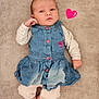 Giulia participe au concours pour gagner de l'argent avec cette photo : baby, infant, denim_dress, striped_shirt, barefoot, blanket, heart_graphic, cute, child, portrait, lying_down, soft_texture, pink, cozy, small_hands, small_feet, casual_clothing, indoor, playful, adorable