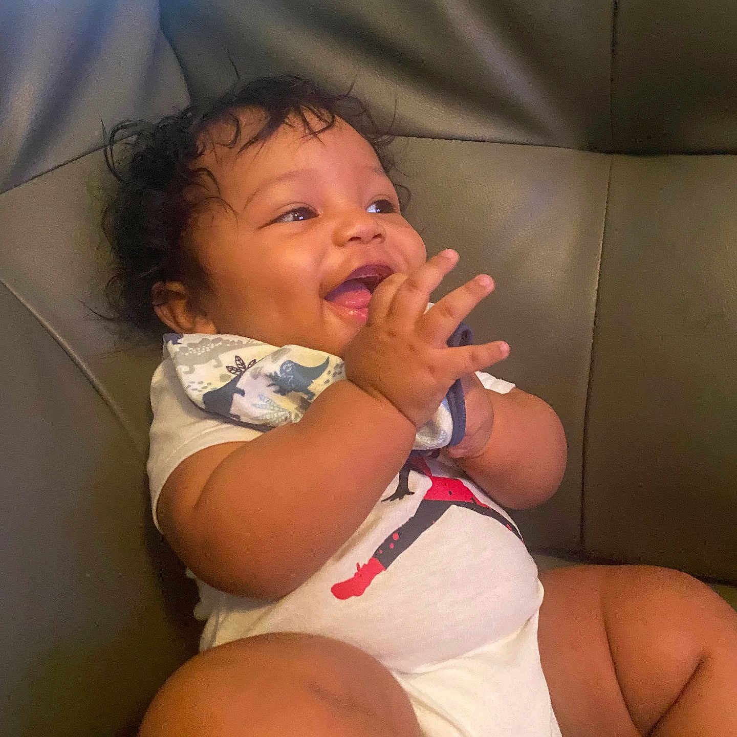 Atreus is registered to the contest to win money with this photo: baby, bodypart, clothing, couch, cream, cushion, cutlery, face, finger, furniture, hand, happy, head, homedecor, person, photography, portrait, shorts, sitting, spoon