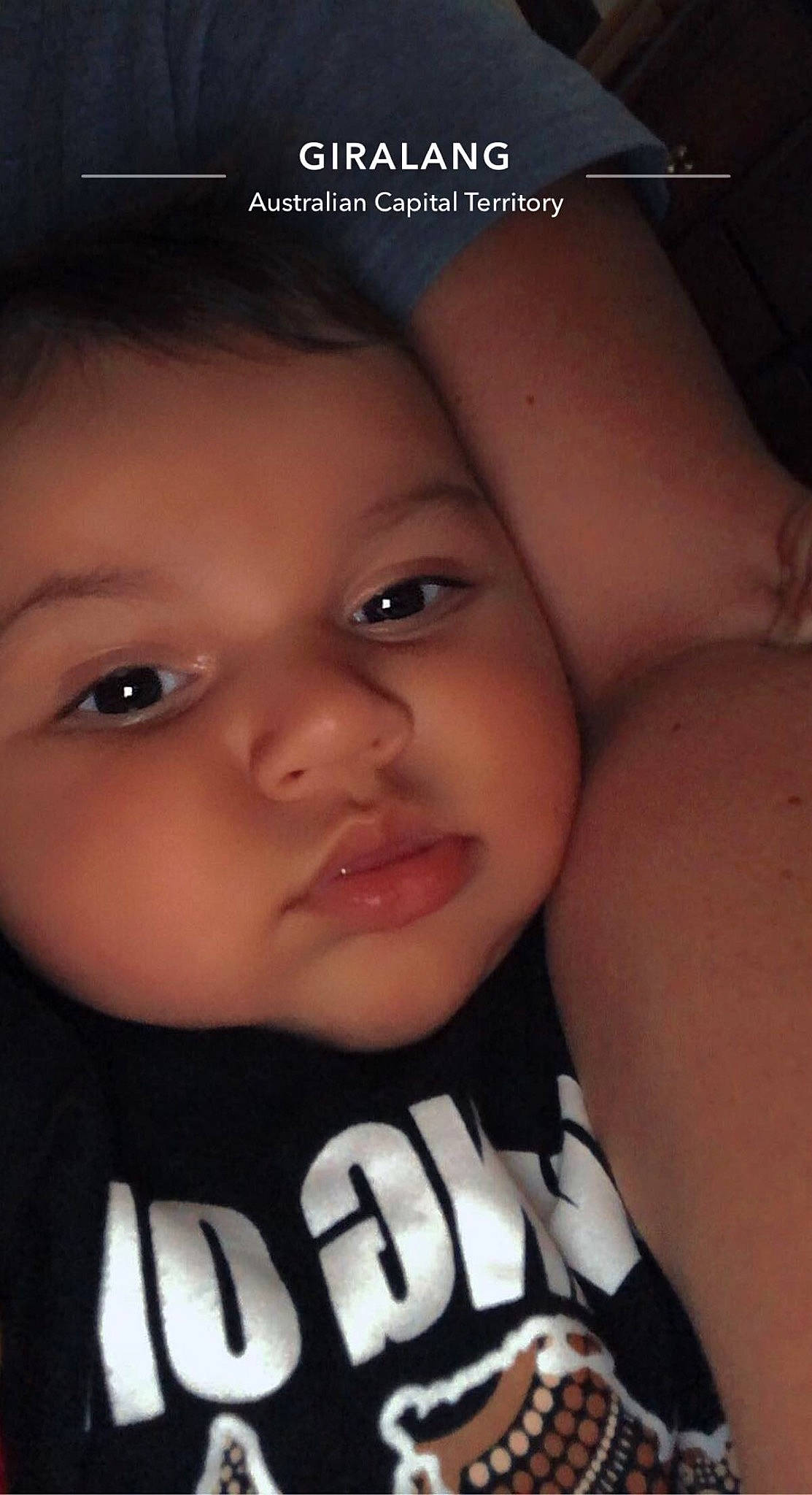 Jemirakye is registered to the contest to win money with this photo: baby, black_hair, cheek, child, chin, eye, eyebrow, eyelash, flash_photography, forehead, gesture, happy, iris, lip, mouth, nose, person, skin, smile, t_shirt