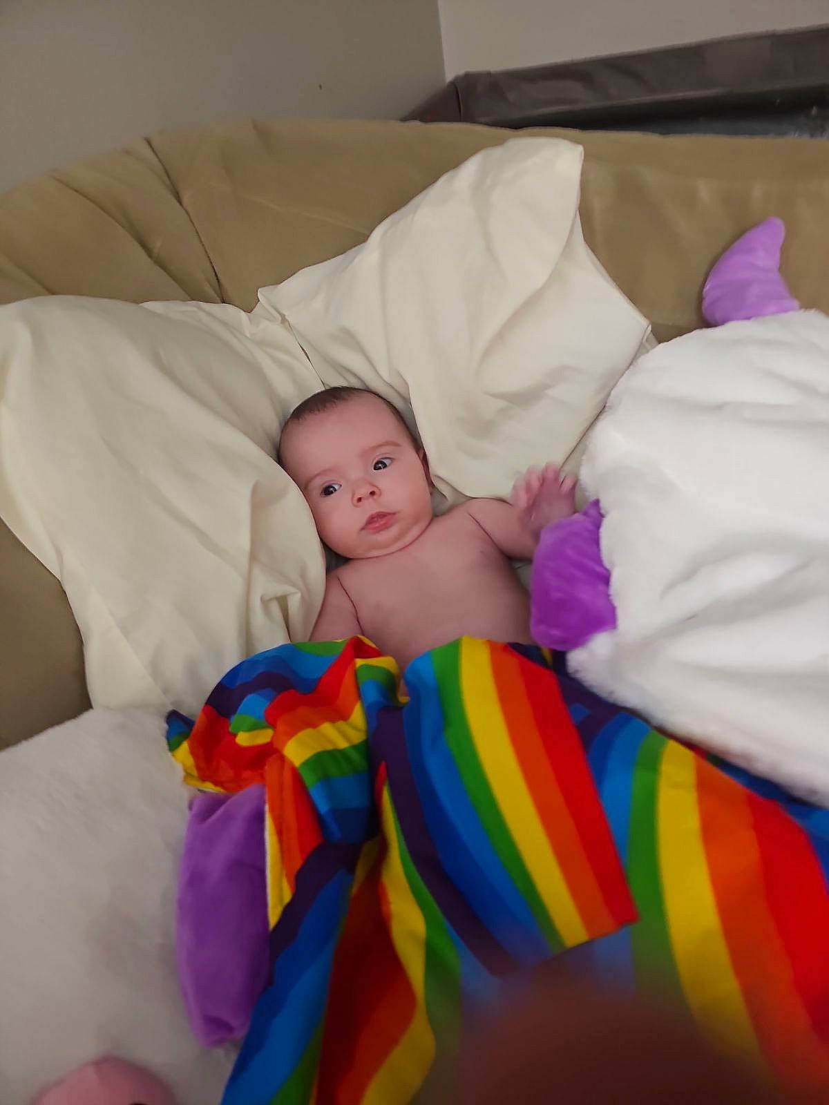 Aunya is registered to the contest to win money with this photo: abdomen, barechested, bed, bed_sheet, bedding, bedroom, bedtime, child, comfort, event, fun, human_leg, linens, pattern, person, pillow, textile, thigh, throw_pillow, toddler