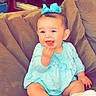 Nevaeh is registered to the contest to win money with this photo: baby, child, blue_dress, bow, smile, couch, living_room, happy, sitting, white_shoes, cute, playful, infant, person, indoors, furniture, cozy, young_child, joyful, portrait