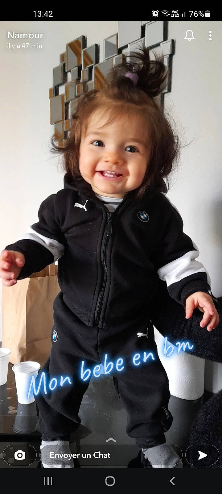 Dayan participe au concours pour gagner de l'argent avec cette photo : baby, baby_toddler_clothing, cheek, child, electric_blue, eye, flash_photography, gesture, hair, happy, human, iris, joy, outerwear, person, sitting, skin, sleeve, smile, standing