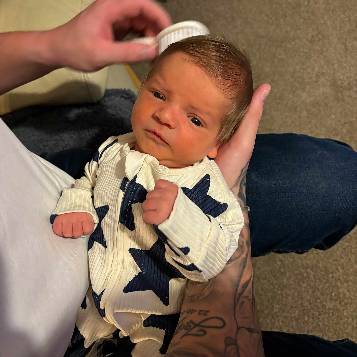 Reggie joined the competition — help win amazing prizes! ankle, arm, baby, bodypart, clothing, couch, cushion, face, finger, furniture, hand, head, homedecor, newborn, pants, person, photography, portrait, skin, tattoo