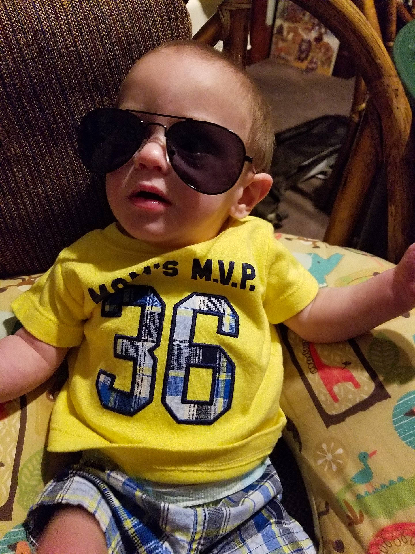 Desmond is registered to the contest to win money with this photo: boy, child, cool, day, eyewear, glasses, headgear, person, product, sunglasses, toddler, vision_care, yellow