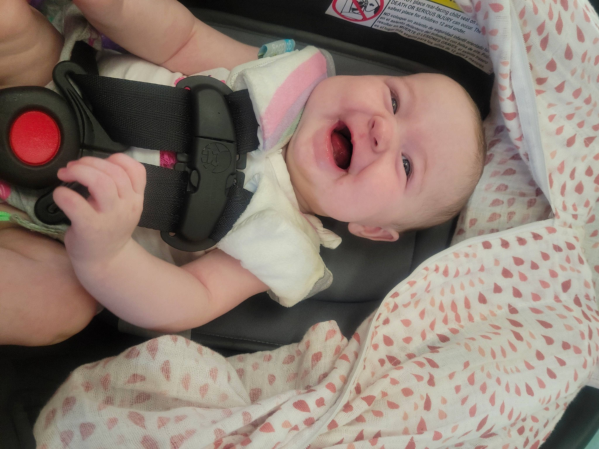 Nora is registered to the contest to win money with this photo: baby, baby_products, baby_toddler_clothing, cameras_optics, child, comfort, eyelash, fashion_accessory, happy, hat, linens, nail, pattern, person, pink, single_lens_reflex_camera, skin, smile, thumb, toddler