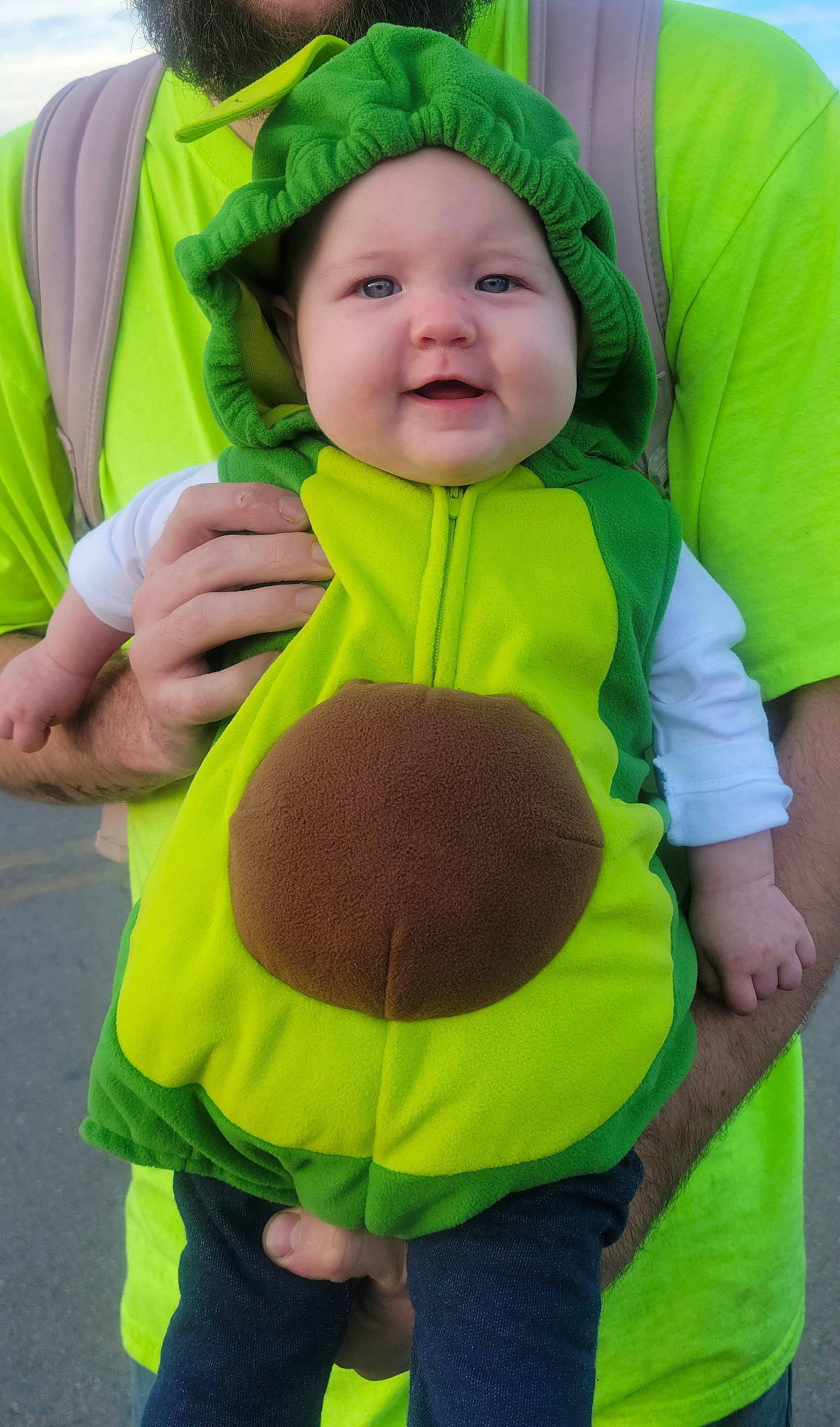 Nora is registered to the contest to win money with this photo: baby, baby_toddler_clothing, child, comfort, cool, finger, fun, grass, green, happy, headgear, headwear, mammal, outerwear, person, sleeve, smile, standing, t_shirt, toddler