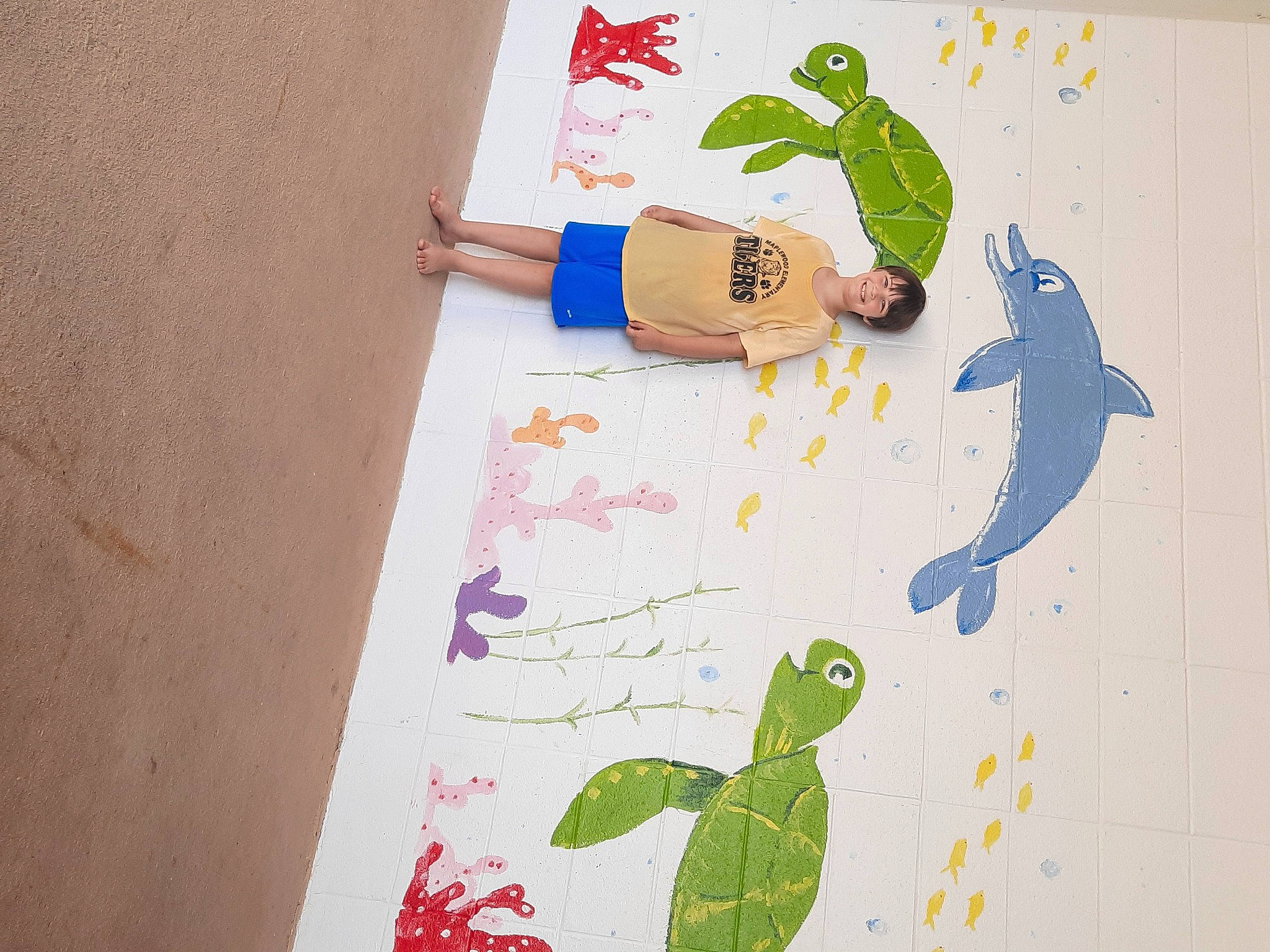 Brayden is registered to the contest to win money with this photo: art, creative_arts, flooring, font, graphics, green, human_leg, illustration, joy, leaf, linens, paint, painting, paper, paper_product, pattern, person, stationery, vertebrate, visual_arts