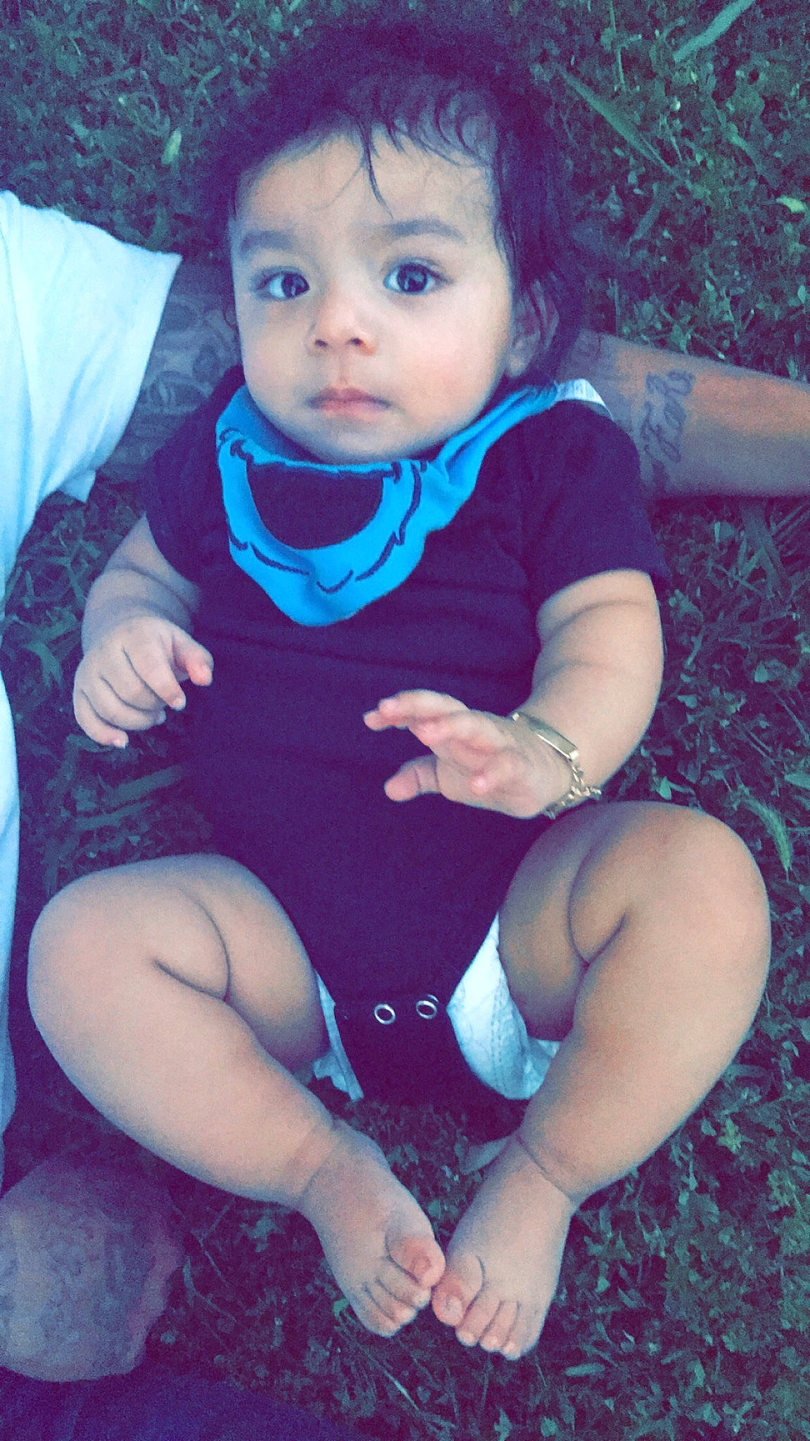 Jason is registered to the contest to win money with this photo: arm, baby, beauty, cheek, child, cool, eye, face, fun, hand, head, leg, lip, muscle, nose, person, pink, sitting, skin, smile