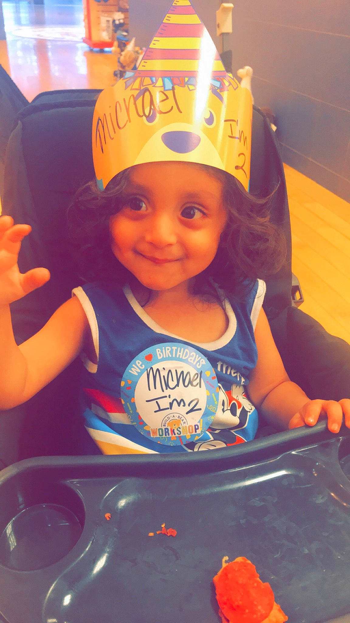 Michael is registered to the contest to win money with this photo: child, cool, fun, headwear, joy, orange, person, play, smile, toddler