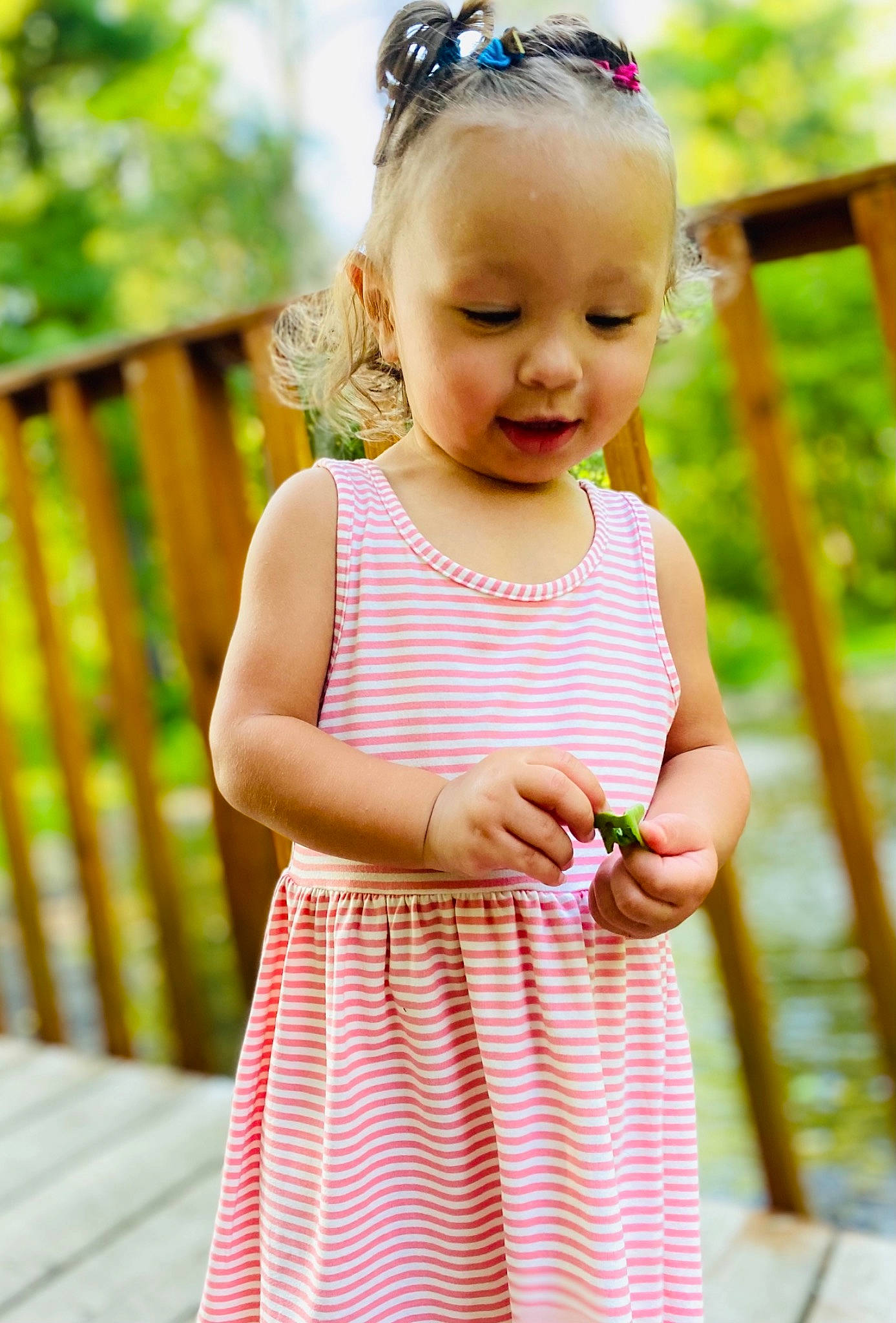 Bayleigh is registered to the contest to win money with this photo: arm, baby, baby_toddler_clothing, day_dress, dress, eye, face, hair, hand, happy, head, one_piece_garment, person, photograph, pink, plant, purple, skin, sleeve, smile