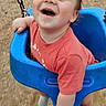 Aaron joined the competition — help win amazing prizes! blue_swing, chain, child, daytime, feet, fun, grass, happy, holding, joy, motion_blur, outdoor, person, play, playground, red_shirt, short_sleeve, smiling, swing, toddler
