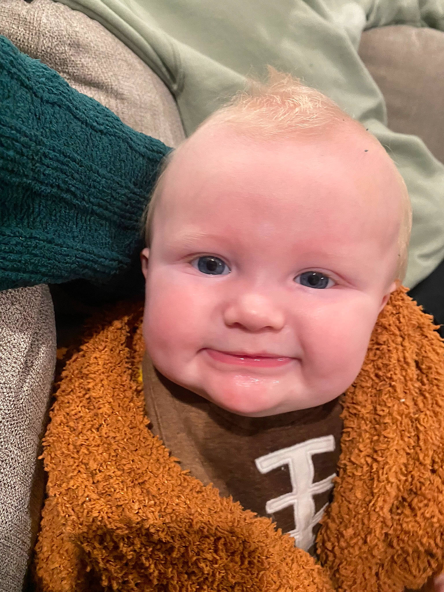 Beckham is registered to the contest to win money with this photo: baby, cheek, child, close_up, comfort, ear, eye, eyebrow, eyelash, happy, head, headgear, iris, lip, nose, person, skin, smile, textile, toddler