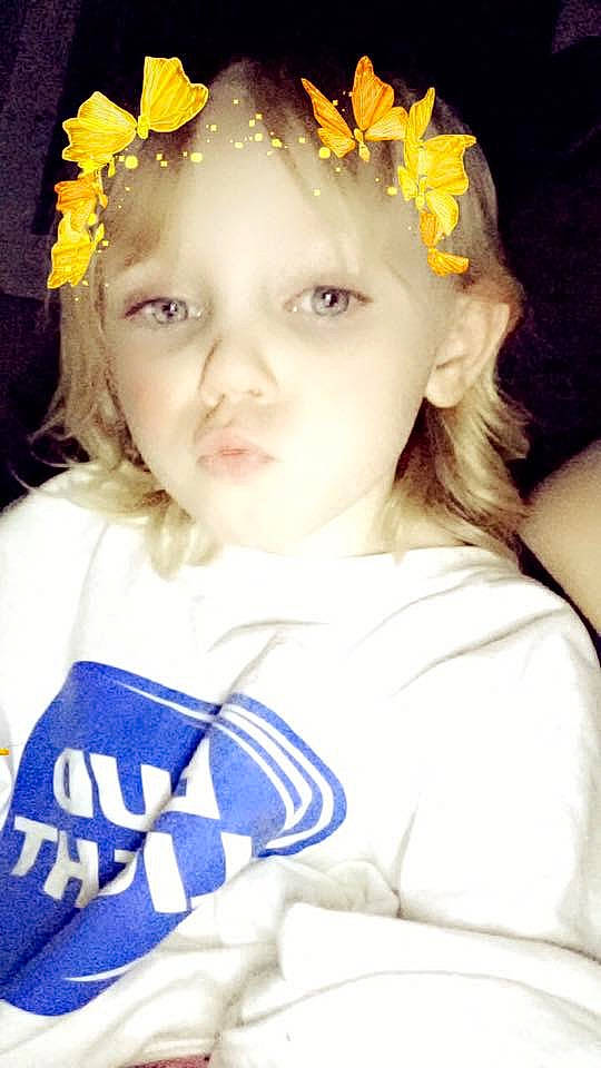 Aubry is registered to the contest to win money with this photo: baby_toddler_clothing, beauty, brown_hair, child, child_model, costume_accessory, day_dress, fashion_accessory, forehead, hair_accessory, headband, headgear, headpiece, headwear, iris, person, petal, portrait_photography, sports_jersey, toddler