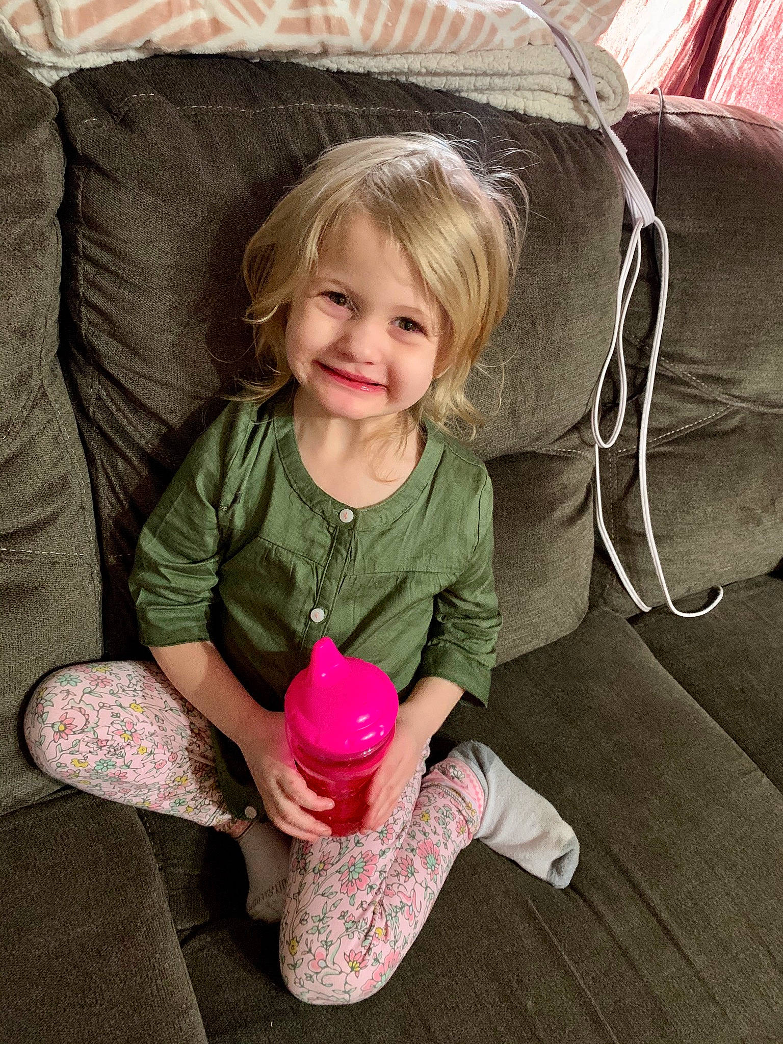 Brielle joined the competition — help win amazing prizes! baby, baby_toddler_clothing, blond, bottle, comfort, couch, joy, living_room, magenta, mouth, person, pink, plastic_bottle, sock, toddler, toy