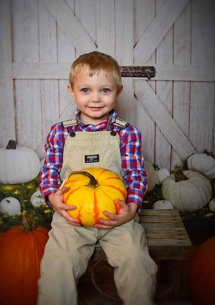Damian Junior is registered to the contest to win money with this photo: _and_melon_family, _gourd, baby_toddler_clothing, calabaza, cucumber, cucurbita, fruit, gourd, iris, joy, local_food, nose, orange, person, produce, pumpkin, shoe, sitting, squash, toddler