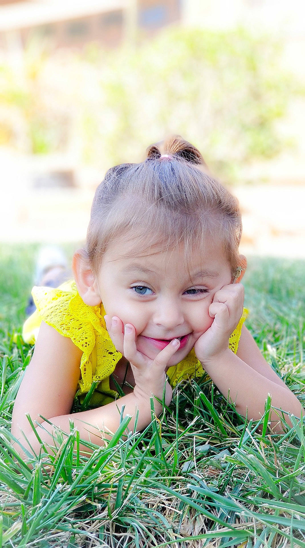 Aiyanna is registered to the contest to win money with this photo: beauty, child, eye, flower, fun, girl, grass, green, happiness, infant, joy, lawn, person, plant, play, portrait_photography, sitting, skin, smile, spring