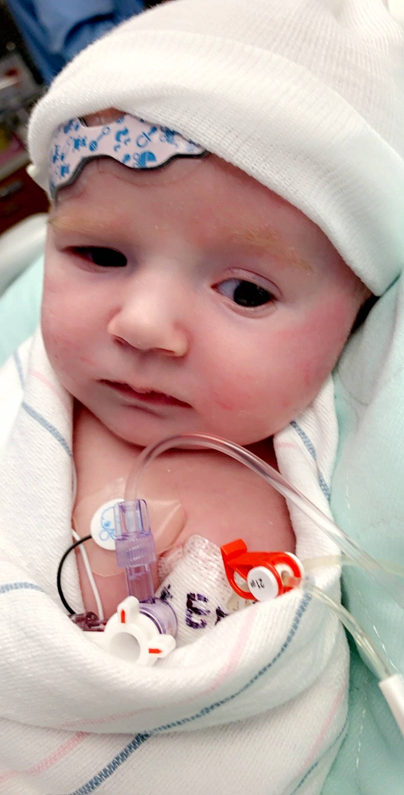 Brynnlee is registered to the contest to win money with this photo: baby, cheek, child, eyelash, headwear, lip, mouth, nose, person, skin, toddler