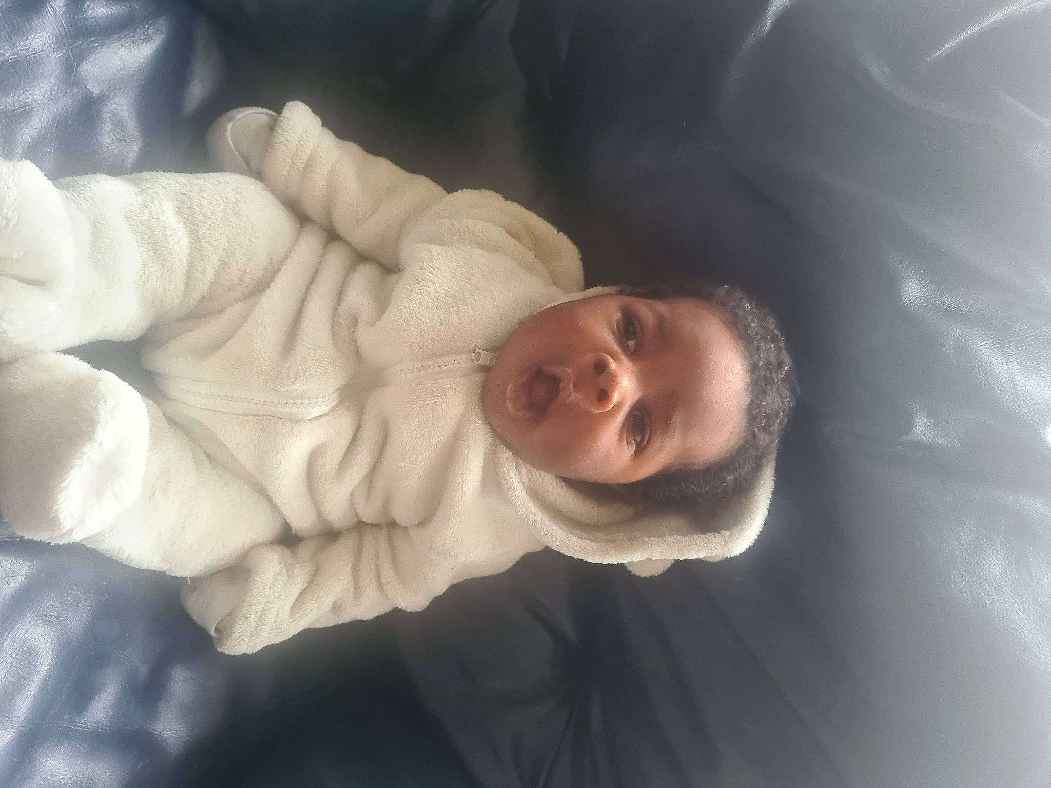 Mark is registered to the contest to win money with this photo: baby, baby_products, baby_toddler_clothing, cheek, child, cloud, comfort, gesture, linens, nap, nose, person, plant, sleep, sleeve, smile, toddler, tree