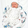 newborn, baby, sleeping, blanket, white_hat, cute, infant, cozy, soft, cartoon_characters, peaceful, clothing, portrait, wrapped, child, adorable, resting, cute_hat, baby_boy, white_background