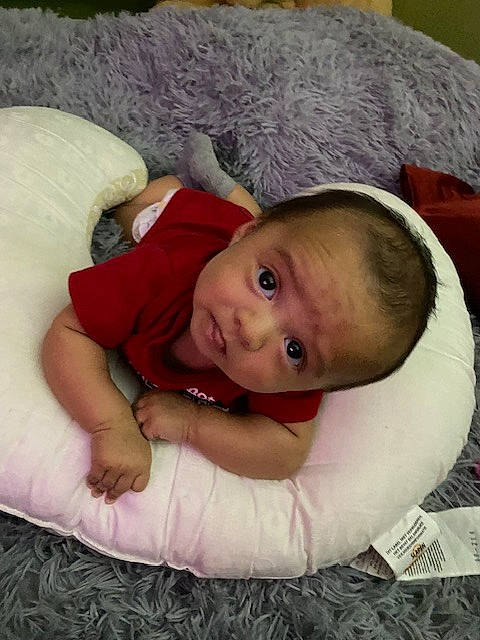 Antonio joined the competition — help win amazing prizes! baby, baby_products, baby_toddler_clothing, child, comfort, couch, eye, iris, linens, person, room, sitting, skin, toddler