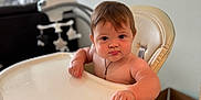 David joined the competition — help win amazing prizes! baby, child, curious, cute, diapers, expression, face, furniture, head, high_chair, indoor, infant, mobile, person, room, seated, skin, skin_tone, toy, young