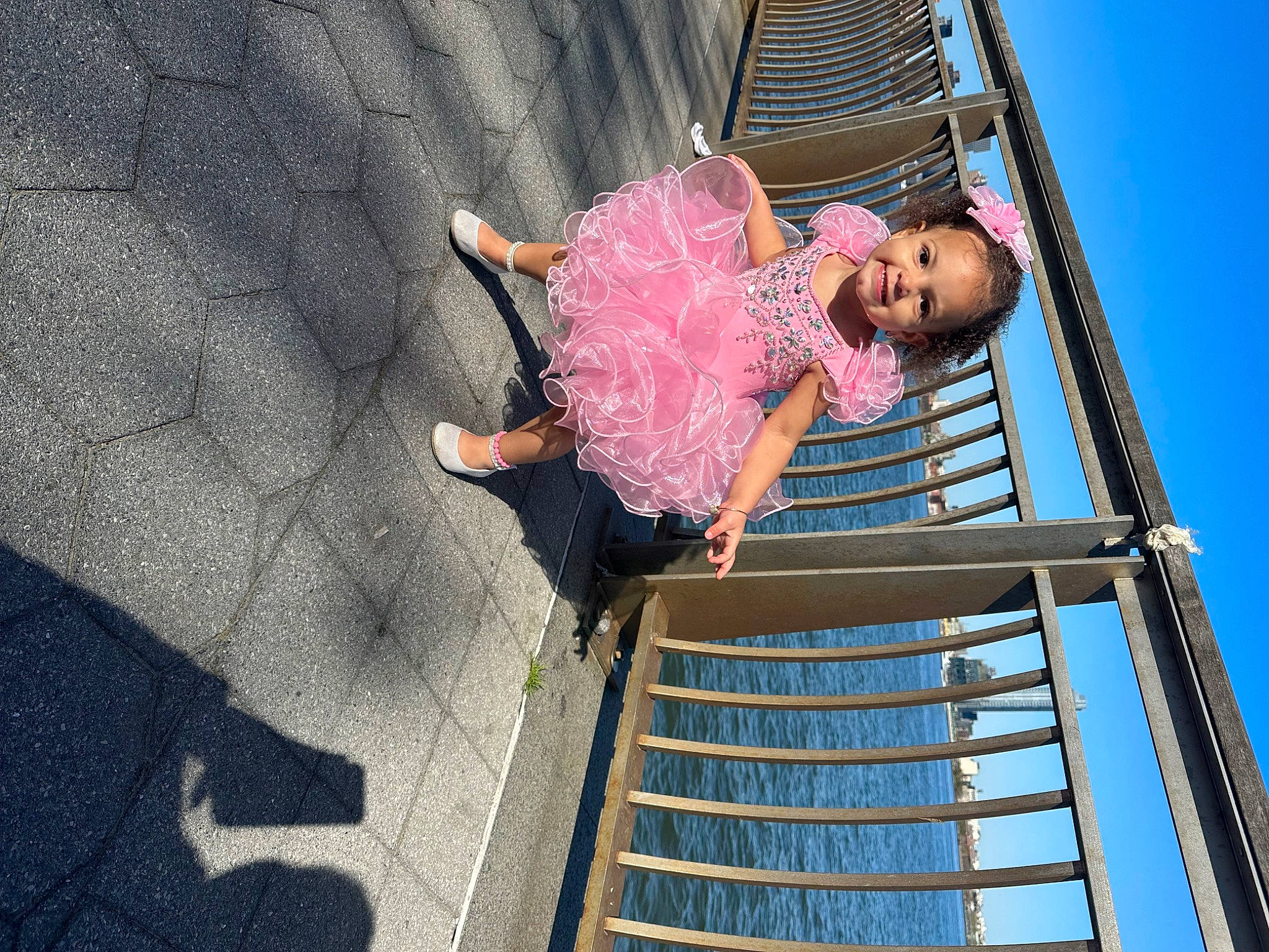 Leiyanni is registered to the contest to win money with this photo: asphalt, baby, child, chute, city, fun, happy, joy, leisure, magenta, outdoor_play_equipment, person, pink, play, playground, recreation, road_surface, sky, stairs, t_shirt