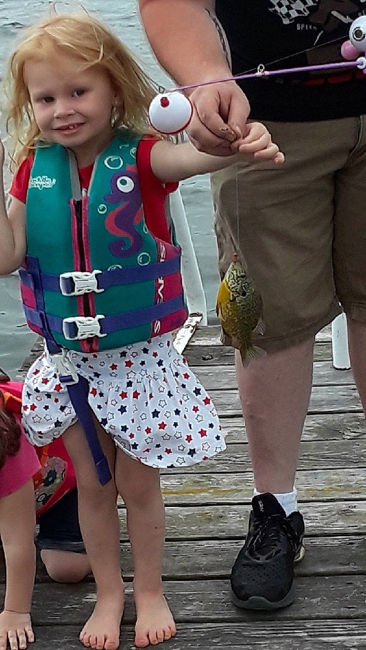 Kierra is registered to the contest to win money with this photo: blond, child, clothing, costume, fashion, footwear, fun, human_leg, joy, leg, person, shoe, shorts, style, thigh, toddler