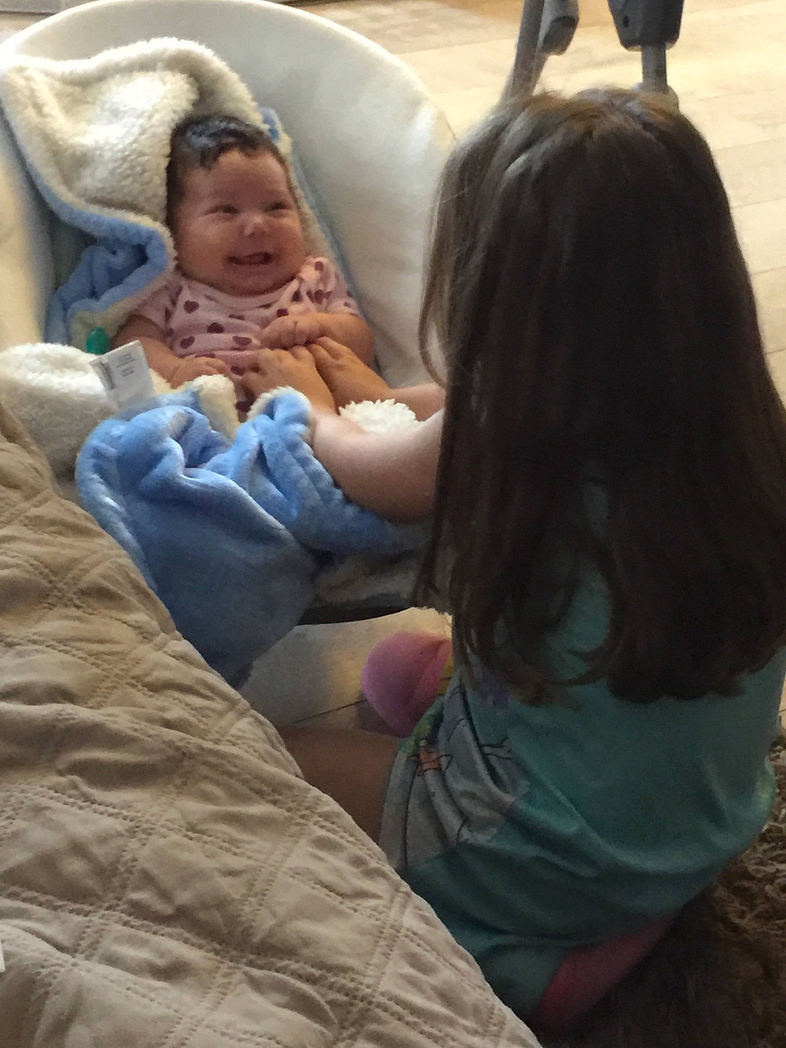 Anabella is registered to the contest to win money with this photo: baby, birth, child, comfort, daughter, fun, leg, linens, long_hair, person, smile, textile, toddler, vacation