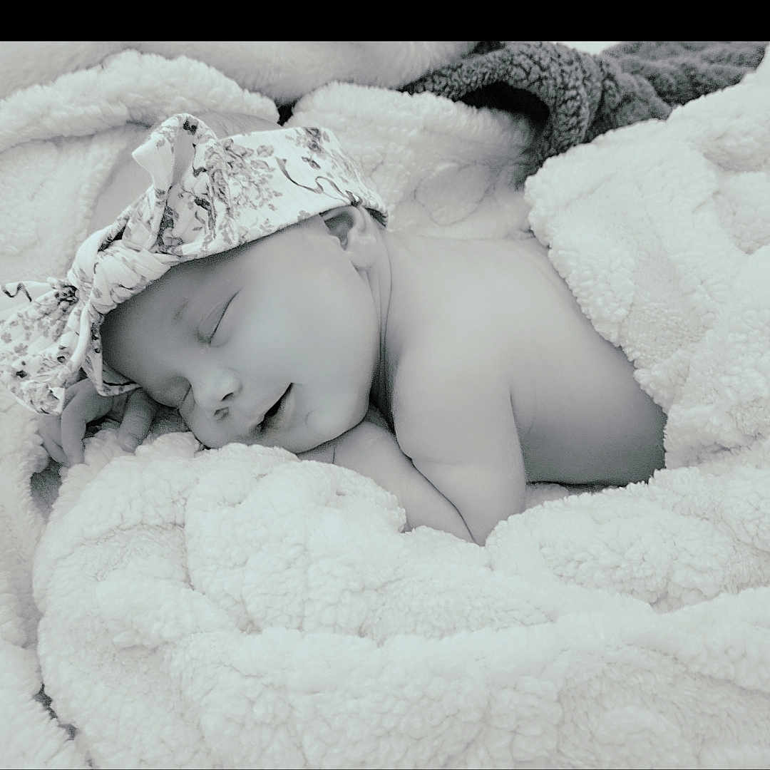 Payten joined the competition — help win amazing prizes! baby, blanket, bow, cheek, closed_eyes, cozy, cuddle, hand, headband, infant, lying_down, monochrome, newborn, nursery, peaceful, portrait, skin, sleeping, smile, soft_texture