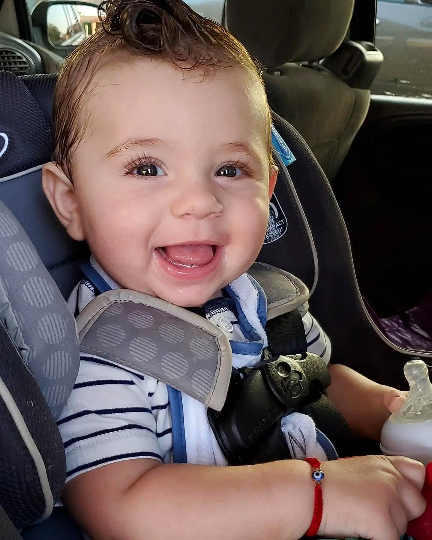 Cruz is registered to the contest to win money with this photo: auto_part, automotive_design, baby, baby_carriage, beauty, car_seat, car_seat_cover, child, comfort, cool, happy, head_restraint, joy, motor_vehicle, person, product, seat_belt, skin, smile, steering_part
