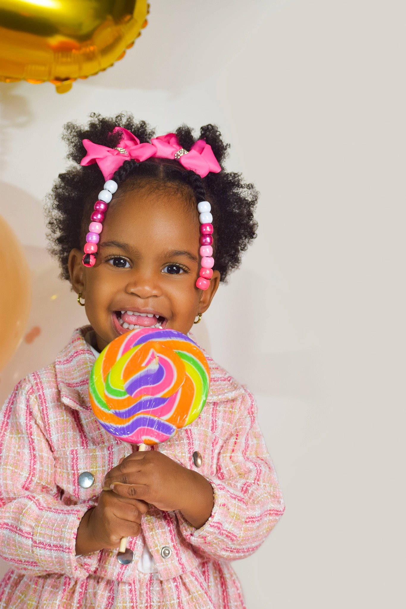 Malia is registered to the contest to win money with this photo: baby_toddler_clothing, birthday, child, dessert, easter, entertainment, event, fashion_accessory, fashion_design, fun, hair_accessory, happy, headgear, joy, magenta, party_supply, person, pink, play, smile