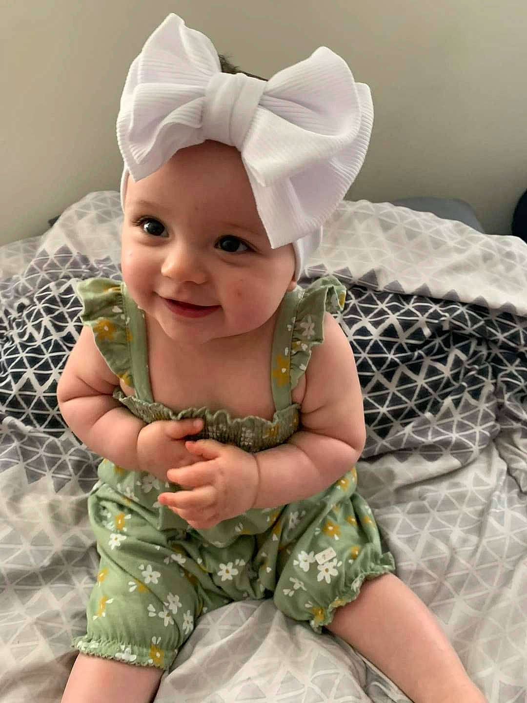 Nevaeh joined the competition — help win amazing prizes! baby, baby_toddler_clothing, cap, costume_hat, day_dress, dress, eye, face, happy, head, headband, headgear, headpiece, headwear, joy, pattern, person, purple, skin, sleeve