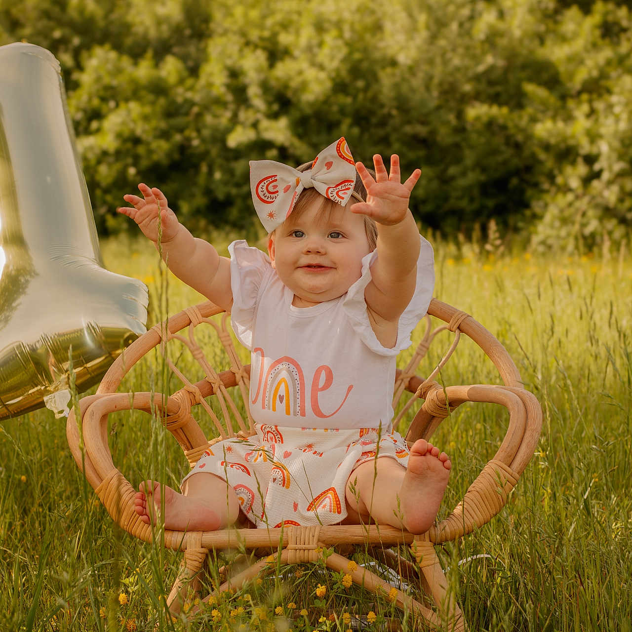 Kaycee is registered to the contest to win money with this photo: baby, bodypart, clothing, face, field, finger, furniture, grass, grassland, hand, hat, head, nature, outdoors, person, photography, plant, portrait, sitting, vegetation