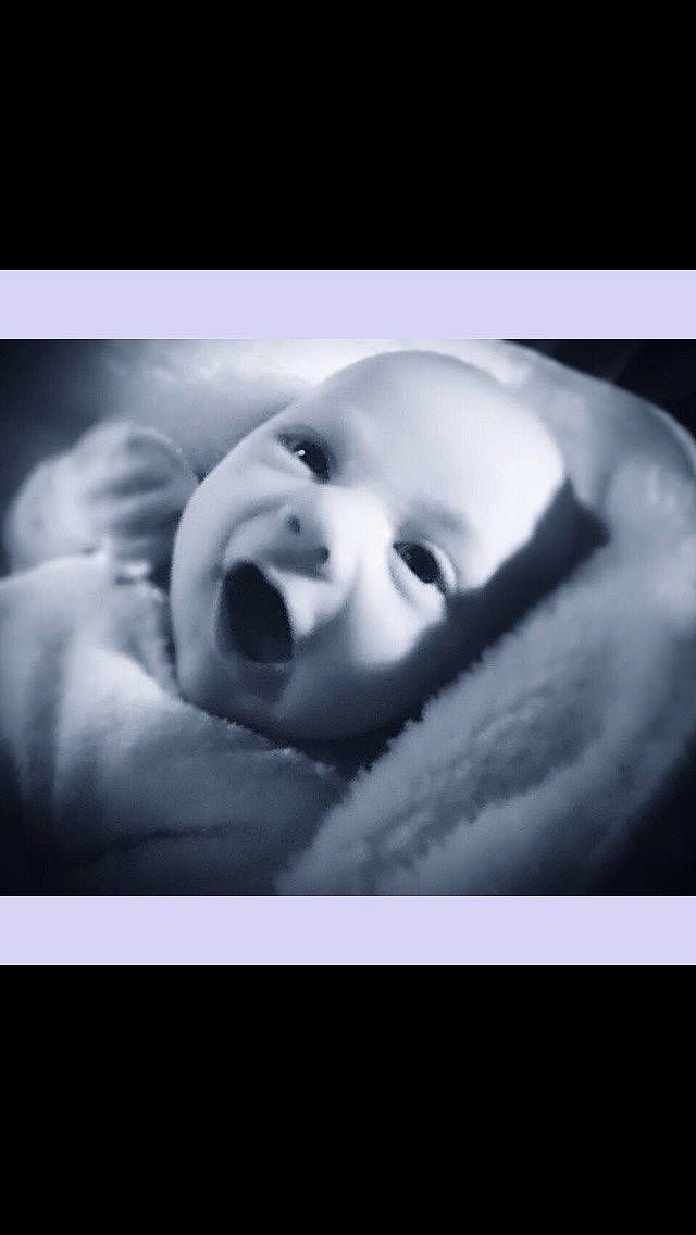 Hayley is registered to the contest to win money with this photo: art, baby, cheek, child, comfort, darkness, eyelash, face, flash_photography, font, gesture, happy, jaw, lip, monochrome, monochrome_photography, mouth, nose, person, smile