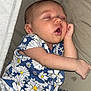 Huntleigh joined the competition — help win amazing prizes! baby, sleeping, infant, floral_clothing, blanket, soft_fabric, cute, peaceful, indoors, child, newborn, resting, portrait, person, skin, hand, face, mouth_open, head, cozy
