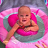 baby, child, swimming, float, pink, water, smiling, happy, infant, summer, outdoor, playful, person, pool, safety, sunlight, cute, fun, hand, swim_school
