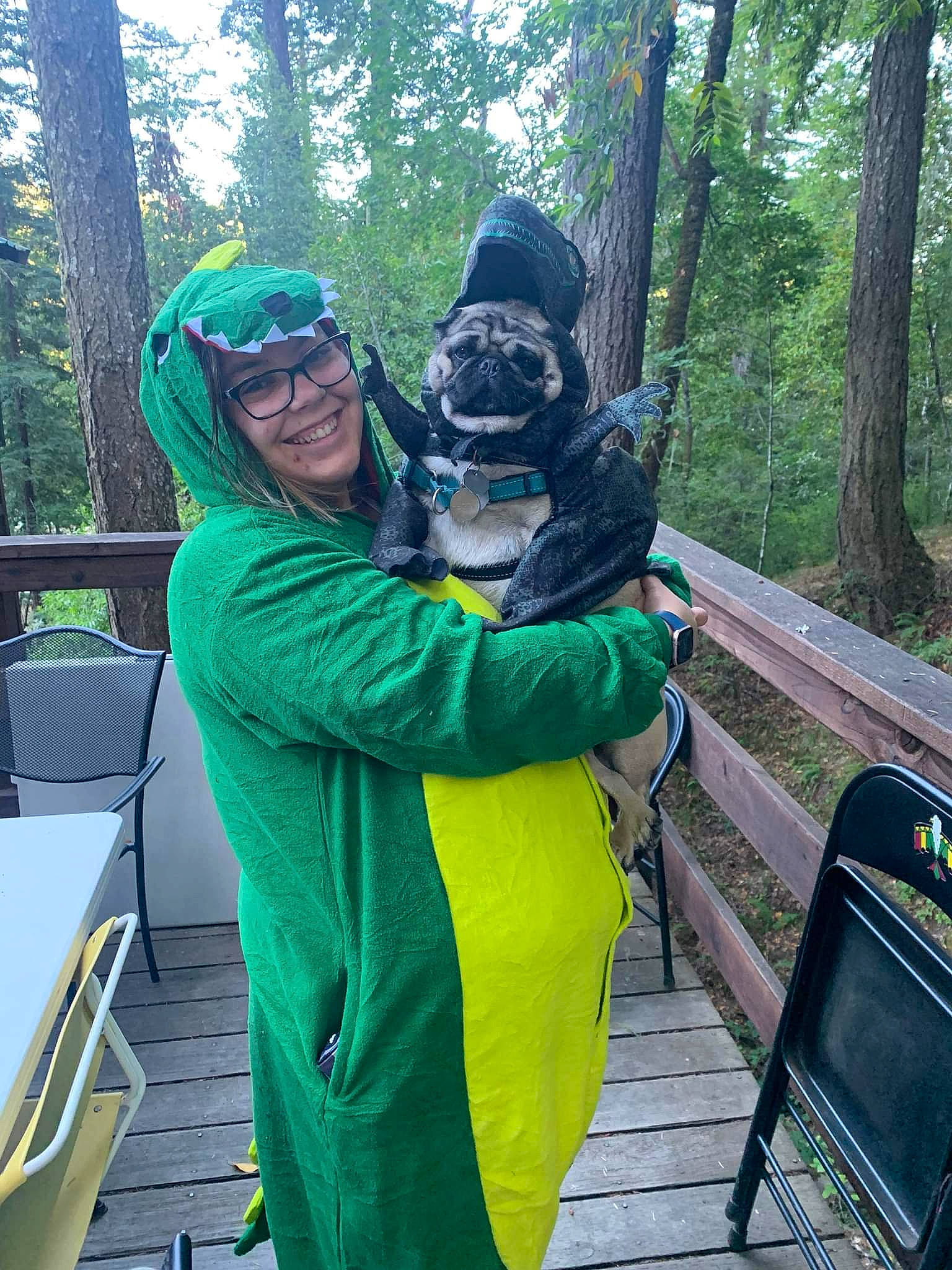 Peggy is registered to the contest to win money with this photo: chair, fictional_character, forest, fun, glove, grass, green, jungle, leisure, personal_protective_equipment, plant, primate, rainforest, recreation, shooting, smile, travel, tree, wildlife, woodland