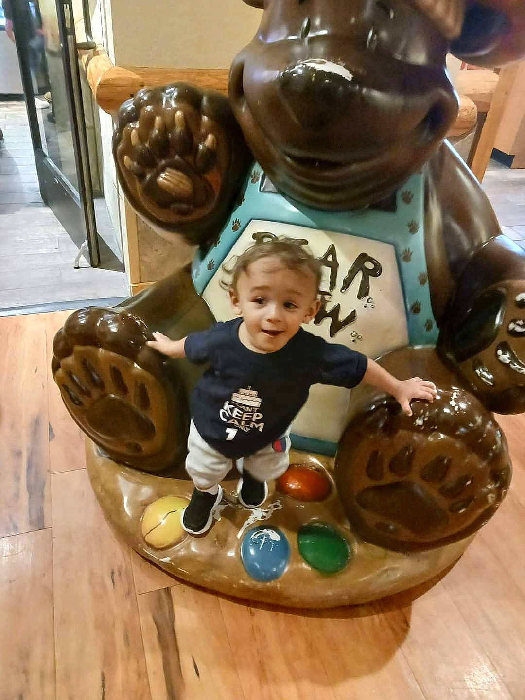 Enoch joined the competition — help win amazing prizes! art, artifact, baby, baby_toddler_clothing, child, circle, fun, glass, leisure, metal, person, play, recreation, sculpture, sitting, toddler, tourist_attraction, wood
